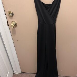 Elegant Black Sleeveless romper with attached belt